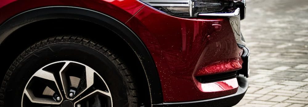 red car with new tyre